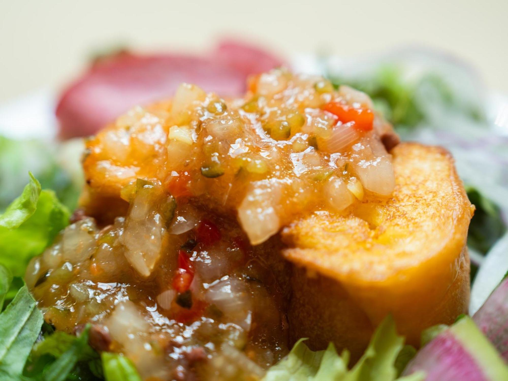 Urayasu Brighton Hotel Tokyo Bay מראה חיצוני תמונה A close-up of a salad with a drizzle of dressing
